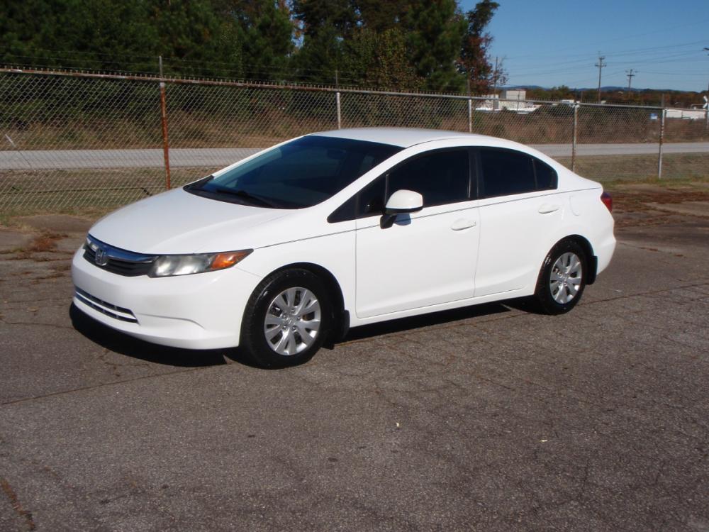 2012 WHITE /GRAY Honda Civic LX Sedan 5-Speed AT (2HGFB2F52CH) with an 1.8L L4 SOHC 16V engine, 5-Speed Automatic transmission, located at 2812 White Horse Road, Greenville, SC, 29611, (864) 269-1711, 34.808655, -82.434776 - 1.8 LITER 4 CYLINDER ENGINE, 15 INCH WHEELS,ANTI LOCK BRAKES, ANTI THEFT SYSTEM,TILT/REACH STEERING, A/C,DUAL AIRBAGS,FRONT/REAR SIDE AIRBAGS,BODY COLOR BUMPERS,MIRRORS,AND DOOR HANDLES,CRUISE CONTROL,USB/AUX OUTLER,VANITY MIRRORS,TRACTION CONTROL,ECO MODE,POWER MIRRORS,WINDOWNS,AND DOOR LOCKS,REAR - Photo #0