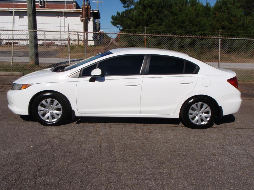 2012 WHITE /GRAY Honda Civic LX Sedan 5-Speed AT (2HGFB2F52CH) with an 1.8L L4 SOHC 16V engine, 5-Speed Automatic transmission, located at 2812 White Horse Road, Greenville, SC, 29611, (864) 269-1711, 34.808655, -82.434776 - 1.8 LITER 4 CYLINDER ENGINE, 15 INCH WHEELS,ANTI LOCK BRAKES, ANTI THEFT SYSTEM,TILT/REACH STEERING, A/C,DUAL AIRBAGS,FRONT/REAR SIDE AIRBAGS,BODY COLOR BUMPERS,MIRRORS,AND DOOR HANDLES,CRUISE CONTROL,USB/AUX OUTLER,VANITY MIRRORS,TRACTION CONTROL,ECO MODE,POWER MIRRORS,WINDOWNS,AND DOOR LOCKS,REAR - Photo #1