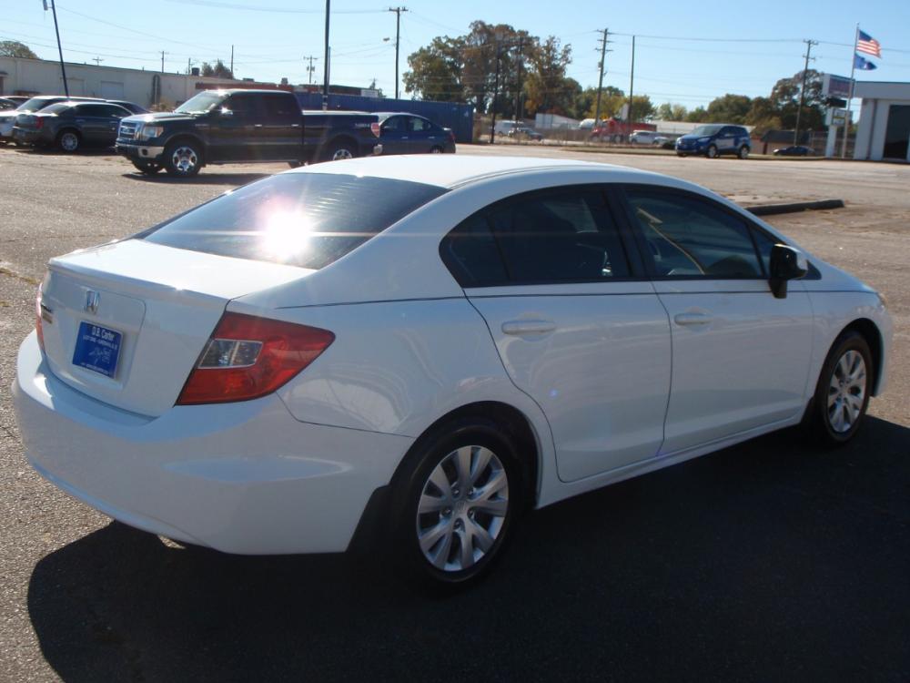 2012 WHITE /GRAY Honda Civic LX Sedan 5-Speed AT (2HGFB2F52CH) with an 1.8L L4 SOHC 16V engine, 5-Speed Automatic transmission, located at 2812 White Horse Road, Greenville, SC, 29611, (864) 269-1711, 34.808655, -82.434776 - 1.8 LITER 4 CYLINDER ENGINE, 15 INCH WHEELS,ANTI LOCK BRAKES, ANTI THEFT SYSTEM,TILT/REACH STEERING, A/C,DUAL AIRBAGS,FRONT/REAR SIDE AIRBAGS,BODY COLOR BUMPERS,MIRRORS,AND DOOR HANDLES,CRUISE CONTROL,USB/AUX OUTLER,VANITY MIRRORS,TRACTION CONTROL,ECO MODE,POWER MIRRORS,WINDOWNS,AND DOOR LOCKS,REAR - Photo #3