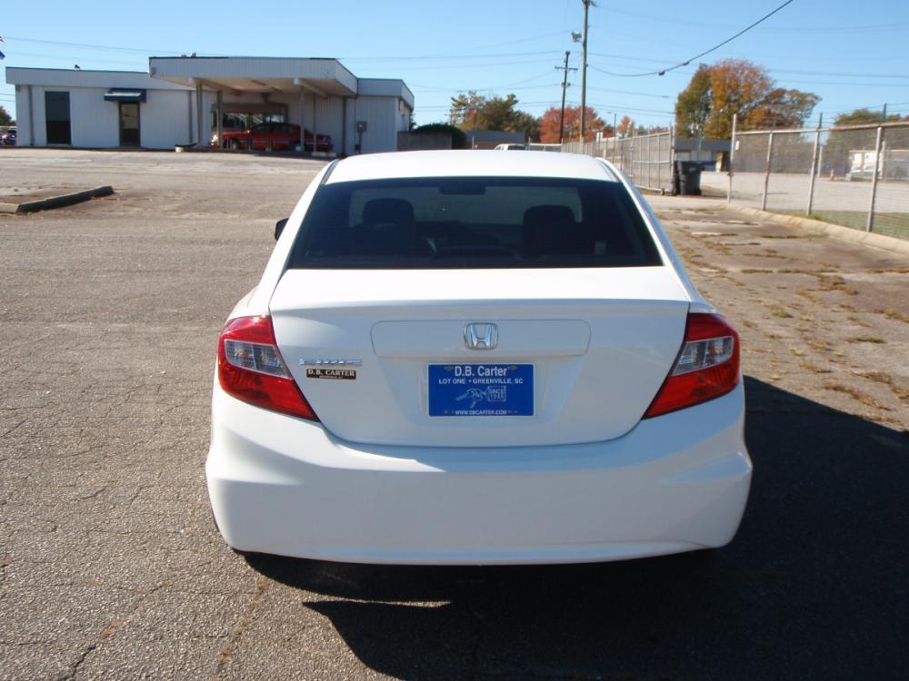 2012 WHITE /GRAY Honda Civic LX Sedan 5-Speed AT (2HGFB2F52CH) with an 1.8L L4 SOHC 16V engine, 5-Speed Automatic transmission, located at 2812 White Horse Road, Greenville, SC, 29611, (864) 269-1711, 34.808655, -82.434776 - 1.8 LITER 4 CYLINDER ENGINE, 15 INCH WHEELS,ANTI LOCK BRAKES, ANTI THEFT SYSTEM,TILT/REACH STEERING, A/C,DUAL AIRBAGS,FRONT/REAR SIDE AIRBAGS,BODY COLOR BUMPERS,MIRRORS,AND DOOR HANDLES,CRUISE CONTROL,USB/AUX OUTLER,VANITY MIRRORS,TRACTION CONTROL,ECO MODE,POWER MIRRORS,WINDOWNS,AND DOOR LOCKS,REAR - Photo #4