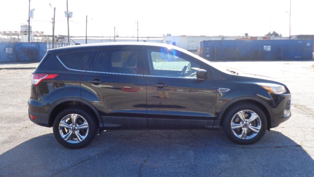 2014 BLACK /TAN Ford Escape SE 4WD (1FMCU9GX0EU) with an 1.6L L4 DOHC 16V engine, 6-Speed Automatic transmission, located at 2812 White Horse Road, Greenville, SC, 29611, (864) 269-1711, 34.808655, -82.434776 - Photo #2