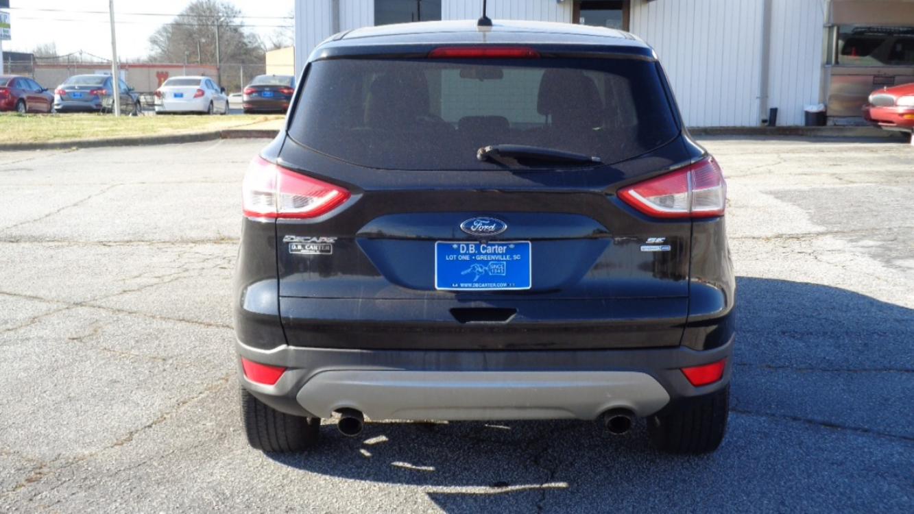 2014 BLACK /TAN Ford Escape SE 4WD (1FMCU9GX0EU) with an 1.6L L4 DOHC 16V engine, 6-Speed Automatic transmission, located at 2812 White Horse Road, Greenville, SC, 29611, (864) 269-1711, 34.808655, -82.434776 - Photo #4