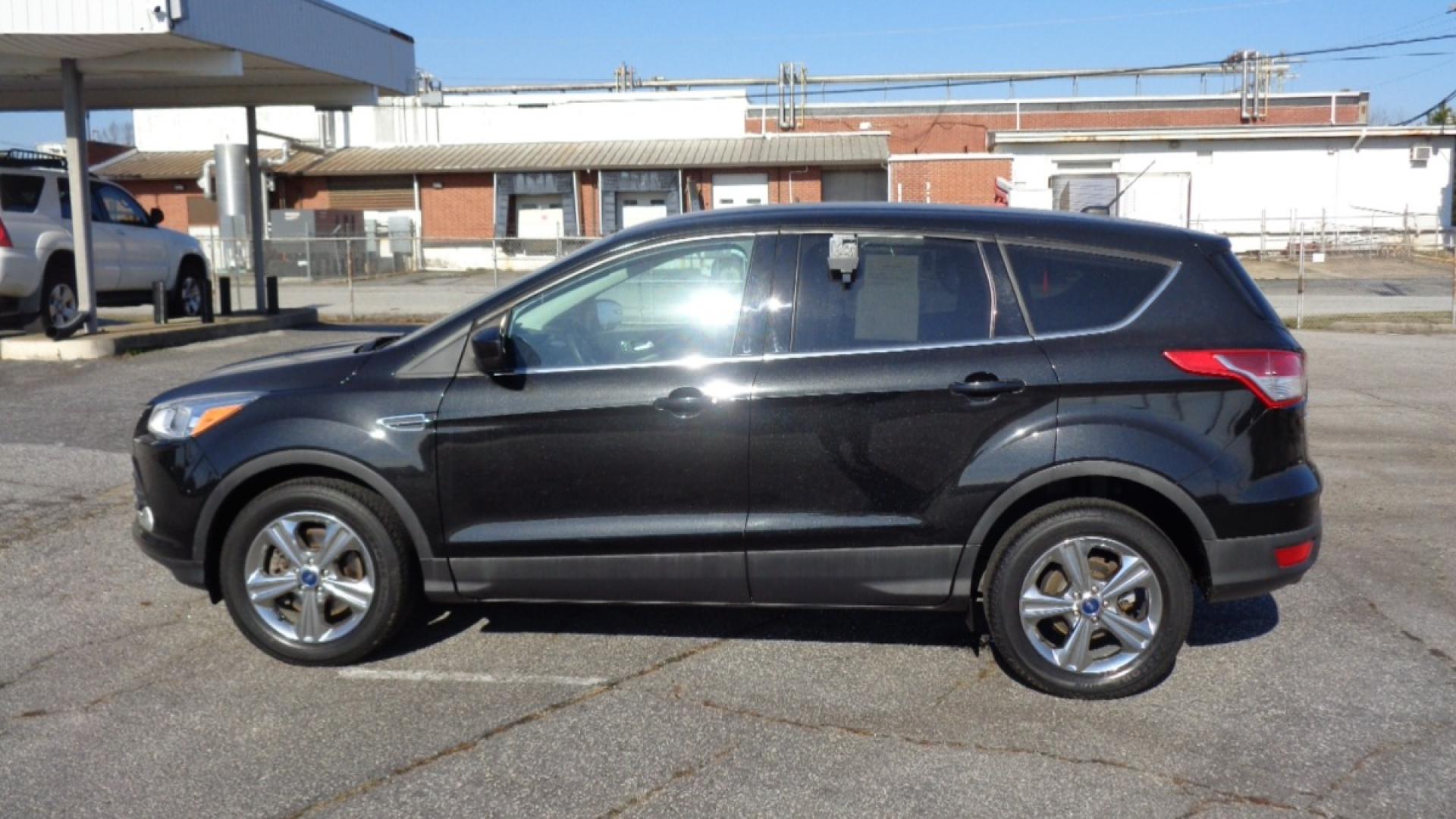 2014 BLACK /TAN Ford Escape SE 4WD (1FMCU9GX0EU) with an 1.6L L4 DOHC 16V engine, 6-Speed Automatic transmission, located at 2812 White Horse Road, Greenville, SC, 29611, (864) 269-1711, 34.808655, -82.434776 - Photo#5