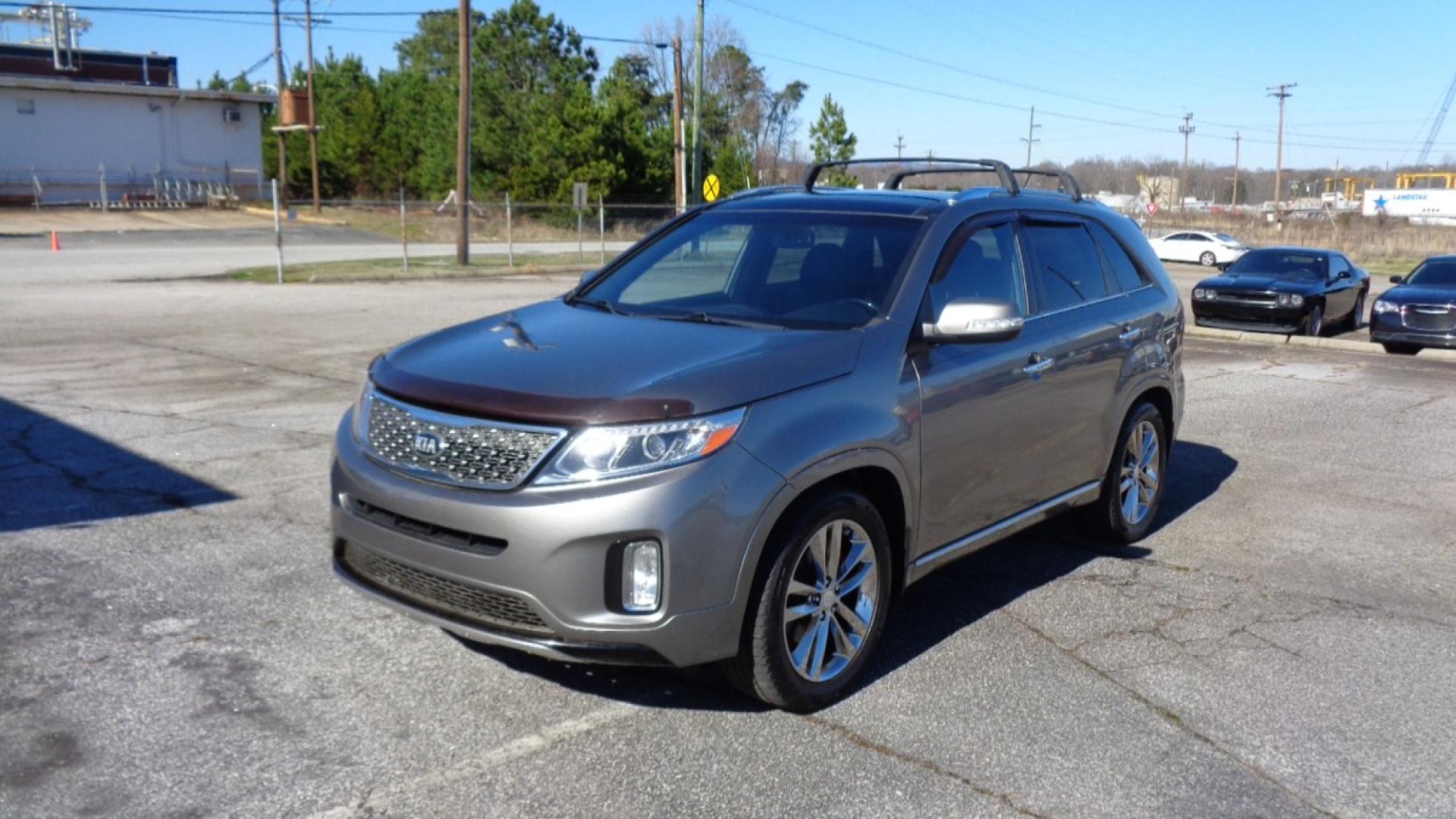 2015 /BLACK Kia Sorento SX V6 AWD (5XYKWDA73FG) with an 3.3L V6 DOHC 24V engine, 6-Speed Automatic transmission, located at 2812 White Horse Road, Greenville, SC, 29611, (864) 269-1711, 34.808655, -82.434776 - 3.3 LITER V6 ENGINE,ALL WHEEL DRIVE,19 INCH ALLOY WHEELS,ANTI LOCK BRAKES,ANTI THEFT SYSTEM,TILT/REACH STEERING,2 ZONE A/C CLIMATE CONTROL,DUAL AIRBAGS,FRONT/REAR SIDE AIRBAGS,BODT COLOR BUMPERS AND MIRRORS,CHROME DOOR HANDLES,CRUISE CONROL,FOG LIGHTS,AUTOMATIC HEADLIGHTS,USB/AUX OUTLETS,LIT VANITY - Photo#0