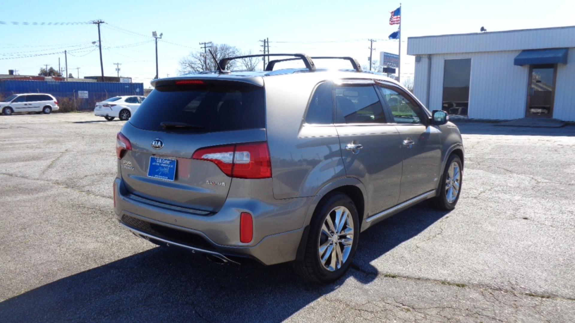2015 /BLACK Kia Sorento SX V6 AWD (5XYKWDA73FG) with an 3.3L V6 DOHC 24V engine, 6-Speed Automatic transmission, located at 2812 White Horse Road, Greenville, SC, 29611, (864) 269-1711, 34.808655, -82.434776 - 3.3 LITER V6 ENGINE,ALL WHEEL DRIVE,19 INCH ALLOY WHEELS,ANTI LOCK BRAKES,ANTI THEFT SYSTEM,TILT/REACH STEERING,2 ZONE A/C CLIMATE CONTROL,DUAL AIRBAGS,FRONT/REAR SIDE AIRBAGS,BODT COLOR BUMPERS AND MIRRORS,CHROME DOOR HANDLES,CRUISE CONROL,FOG LIGHTS,AUTOMATIC HEADLIGHTS,USB/AUX OUTLETS,LIT VANITY - Photo#3