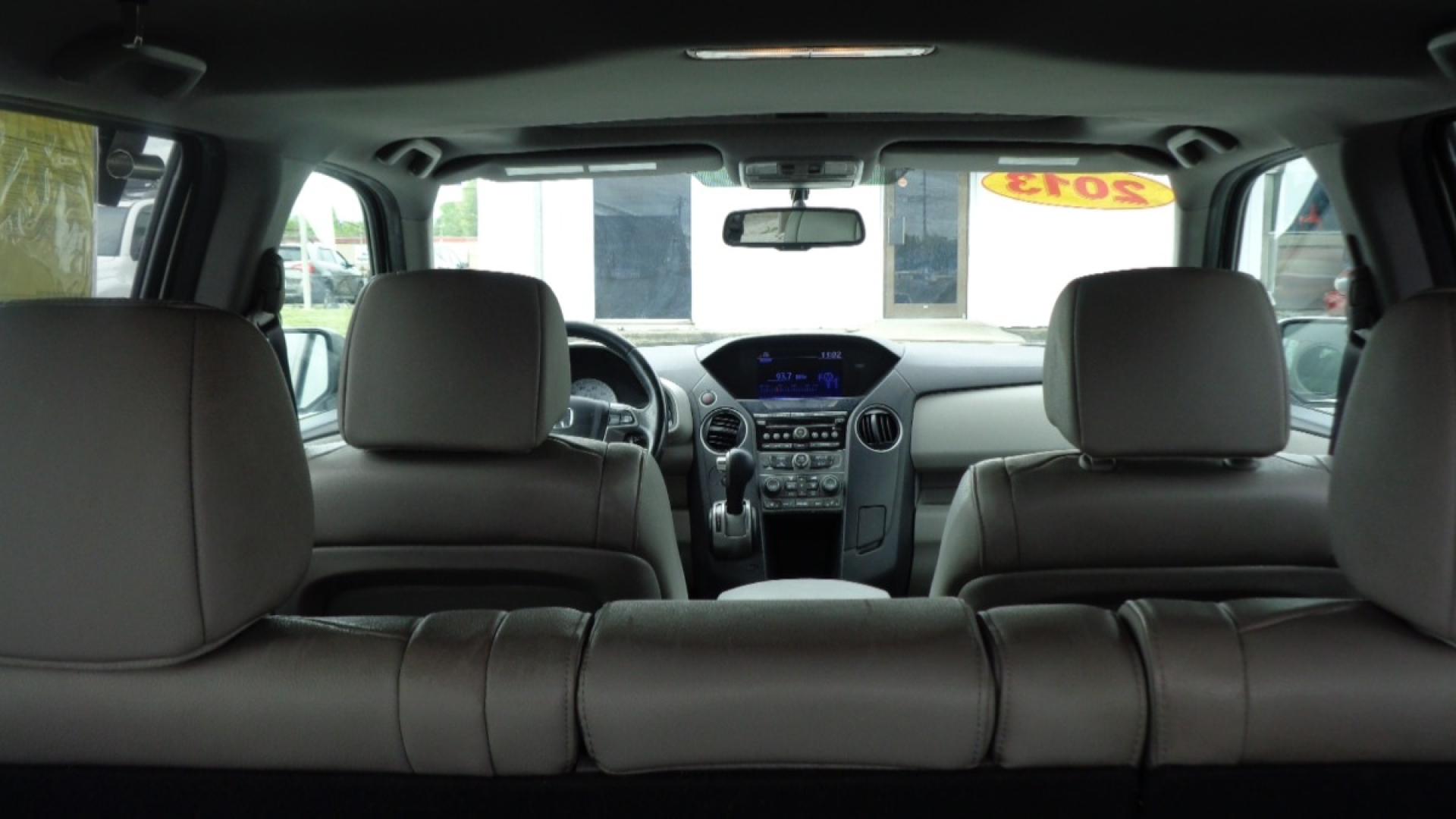 2013 WHITE /GRAY Honda Pilot EX-L 2WD 5-Spd AT (5FNYF3H53DB) with an 3.5L V6 SOHC 24V engine, 5-Speed Automatic transmission, located at 2812 White Horse Road, Greenville, SC, 29611, (864) 269-1711, 34.808655, -82.434776 - 3.5L V6 ENGINE,ALLOY WHEELS,ANTI LOCK BRAKES,ANTI THEFT SYSTEM,TILT/REACH STEERING,A/C, 2 ZONE A/C CLIMATE CONTROL,DUAL A/C,DUAL AIRBAGS,FRONT/REAR SIDE AIRBAGS,BODY COLOR BUMPERS,MIRRORS,AND DOOR HANDLES,CRUISE CONTROL,AUTOMATIC HEADLIGHTS,FOG LIGHTS,USB/AUX OUTLET,LIT VANITY MIRRORS,TRACTION CONTR - Photo#7