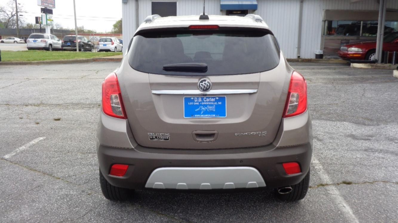 2015 SANDY BROWN /BLACK Buick Encore Premium AWD (KL4CJHSB8FB) with an 1.4L L4 DOHC 16V TURBO engine, 6-Speed Automatic transmission, located at 2812 White Horse Road, Greenville, SC, 29611, (864) 269-1711, 34.808655, -82.434776 - 1.4 LITER 4 CYLINDER TURBO,ALL WHEEL DRIVE,18 INCH ALLOY WHEELS,ANTI LOCK BRAKES,ANTI THEFT SYSTEM,TILT/REACH STEERING,A/C,2 ZONE A/C CLIMATE CONTROL,FRONT SIDE AIRBAGS,BODY COLOR BUMPERS,MIRRORS AND DOOR HANDLES,CRUISE CONTROL,FOG LIGHTS,AUTOMATIC HEADLIGHTS,USB/AUX OUTLET,LIT VANITY MIRRORS, POWER - Photo #4