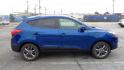 2014 BLUE /TAN Hyundai Tucson GLS 2WD (KM8JU3AG0EU) with an 2.4L L4 DOHC 16V engine, 6-Speed Automatic transmission, located at 2812 White Horse Road, Greenville, SC, 29611, (864) 269-1711, 34.808655, -82.434776 - 3.4 LITER 4 CYLINDER ENGINE,17 INC HALLOY WHEELS,TILT/REECH STEERING.A/C,DUAL AIRBAGS,SIDE AIRBAGS,BODY COLOR BUMPERS,MIRRORS,AND DOOR HANDLES,CRUISE CONTROL,FOG LIGHTS,AUTOMATIC HEADLIGHTS,LEATHER SEATS,HEATED SEATS,USB/AUX OUTLET,LIT VANITY MIRRORS,TRACTION CONTROL,POWER MIRRORS,WINDOWS AND DOOR L - Photo #2