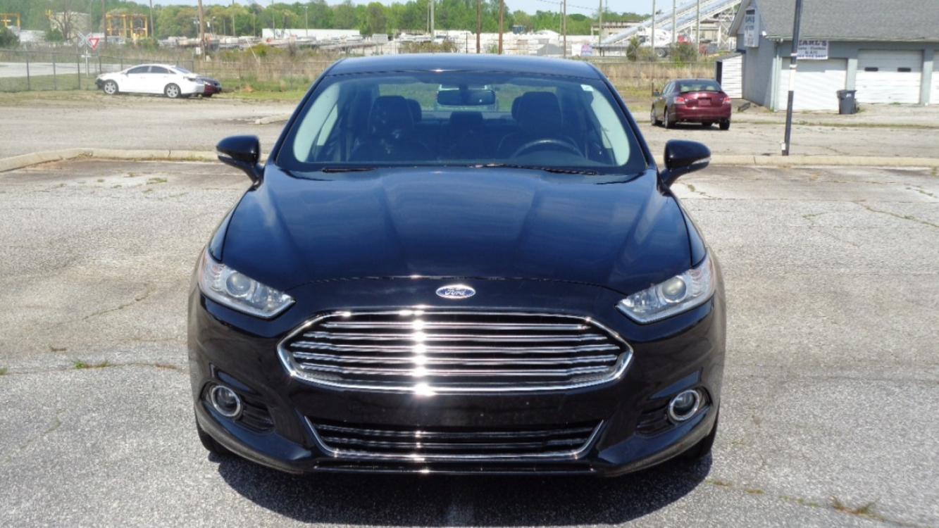 2016 BLACK /BLACK Ford Fusion Titanium (3FA6P0K99GR) with an 2.0L L4 DOHC 16V engine, 6-Speed Automatic transmission, located at 2812 White Horse Road, Greenville, SC, 29611, (864) 269-1711, 34.808655, -82.434776 - Photo #1
