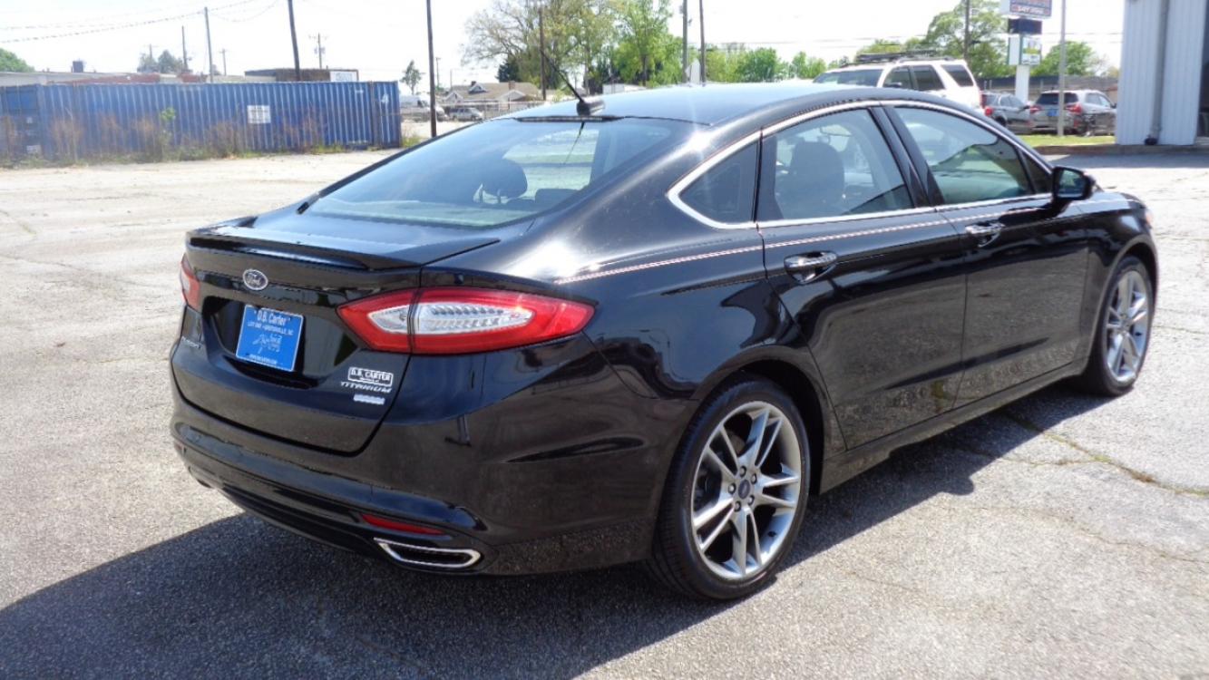 2016 BLACK /BLACK Ford Fusion Titanium (3FA6P0K99GR) with an 2.0L L4 DOHC 16V engine, 6-Speed Automatic transmission, located at 2812 White Horse Road, Greenville, SC, 29611, (864) 269-1711, 34.808655, -82.434776 - Photo #3