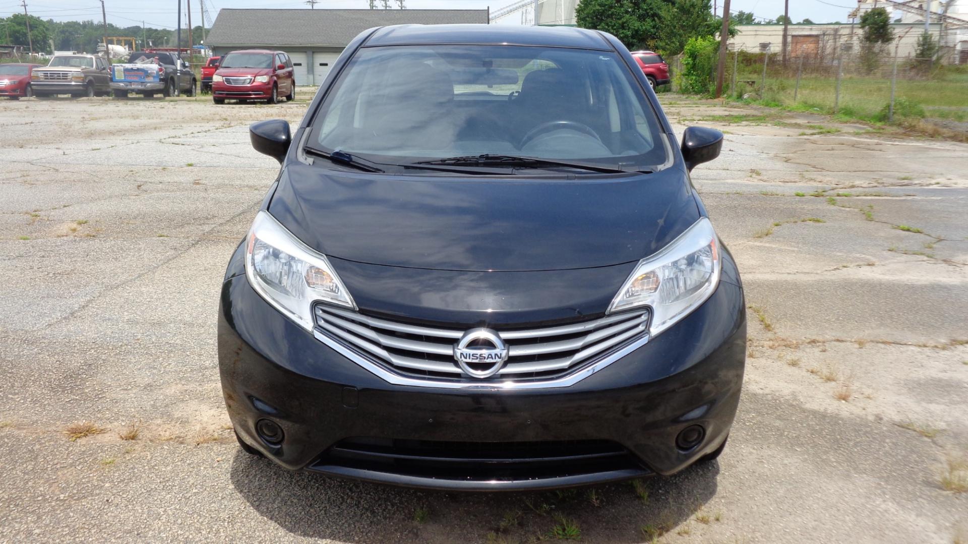 2016 BLACK /BLACK Nissan Versa Note S (3N1CE2CPXGL) with an 1.6L L4 DOHC 16V engine, 5M transmission, located at 2812 White Horse Road, Greenville, SC, 29611, (864) 269-1711, 34.808655, -82.434776 - 1.6 LITER 4 CYLINDER ENGINE, 15 INCH WHEELS,ANTI LOCK BRAKES,ANTI THEFT SYSTEM,TILT STEERING,A/C,DUAL AIRBAGS,FRONT SIDE AIRBAGS,BODY COLOR BUMPERS,MIRRORS,AND DOOR HANDLES,FRONT/REAR READING LIGHTS,CRUISE CONTROL,USB/AUX OUTLET,VANITY MIRRORS,TRACTION CONTROL,POWER MIRRORS,WINDOWS,AND DOOR LOCKS,RA - Photo#1