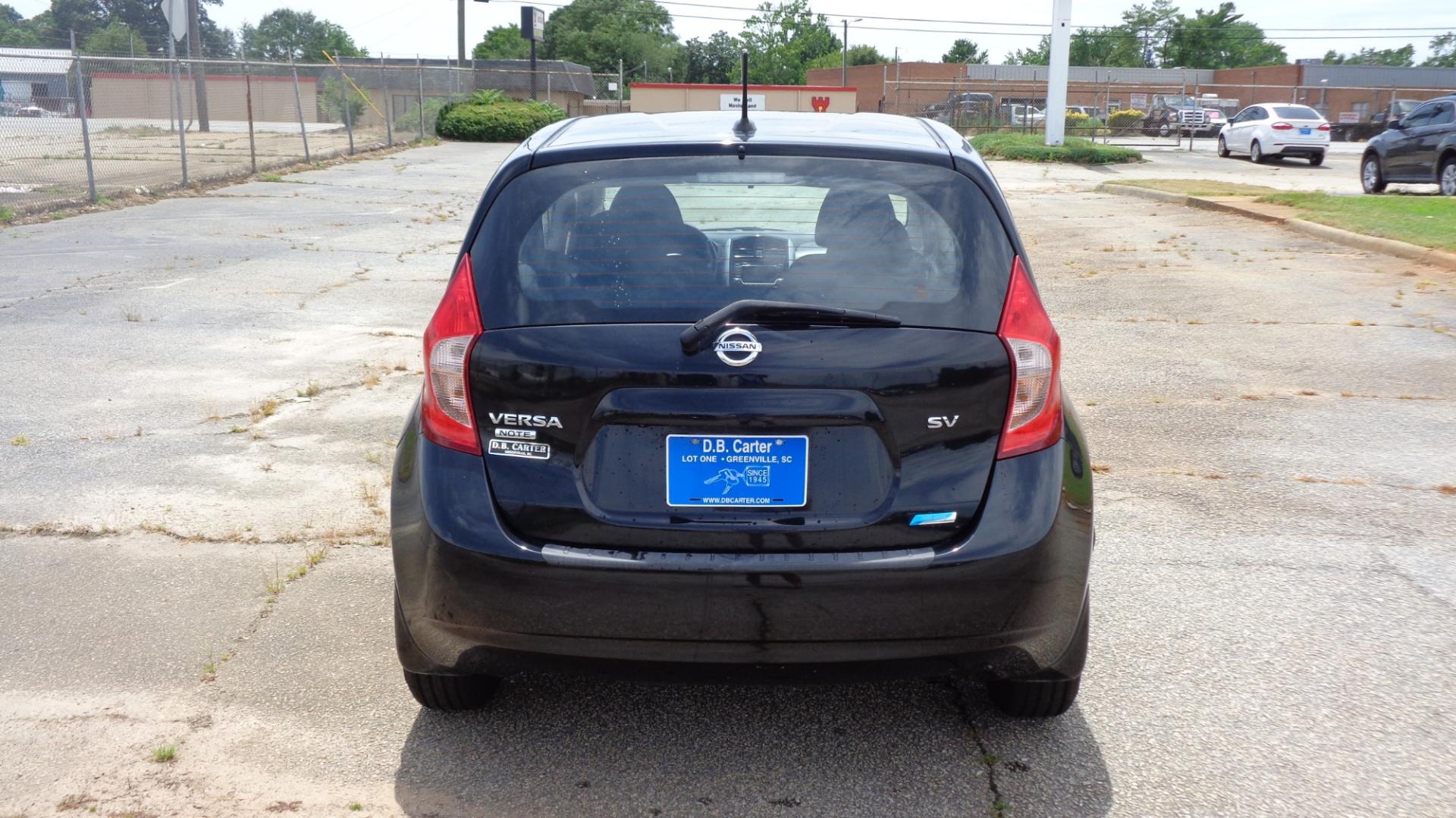 2016 BLACK /BLACK Nissan Versa Note S (3N1CE2CPXGL) with an 1.6L L4 DOHC 16V engine, 5M transmission, located at 2812 White Horse Road, Greenville, SC, 29611, (864) 269-1711, 34.808655, -82.434776 - 1.6 LITER 4 CYLINDER ENGINE, 15 INCH WHEELS,ANTI LOCK BRAKES,ANTI THEFT SYSTEM,TILT STEERING,A/C,DUAL AIRBAGS,FRONT SIDE AIRBAGS,BODY COLOR BUMPERS,MIRRORS,AND DOOR HANDLES,FRONT/REAR READING LIGHTS,CRUISE CONTROL,USB/AUX OUTLET,VANITY MIRRORS,TRACTION CONTROL,POWER MIRRORS,WINDOWS,AND DOOR LOCKS,RA - Photo#4