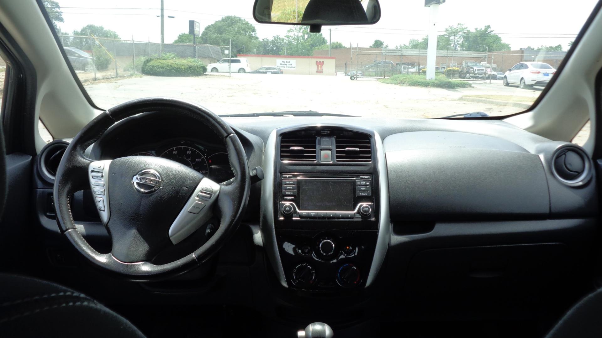 2016 BLACK /BLACK Nissan Versa Note S (3N1CE2CPXGL) with an 1.6L L4 DOHC 16V engine, 5M transmission, located at 2812 White Horse Road, Greenville, SC, 29611, (864) 269-1711, 34.808655, -82.434776 - 1.6 LITER 4 CYLINDER ENGINE, 15 INCH WHEELS,ANTI LOCK BRAKES,ANTI THEFT SYSTEM,TILT STEERING,A/C,DUAL AIRBAGS,FRONT SIDE AIRBAGS,BODY COLOR BUMPERS,MIRRORS,AND DOOR HANDLES,FRONT/REAR READING LIGHTS,CRUISE CONTROL,USB/AUX OUTLET,VANITY MIRRORS,TRACTION CONTROL,POWER MIRRORS,WINDOWS,AND DOOR LOCKS,RA - Photo#6